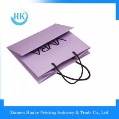 Topp kvalitet lilla appreal industriell bruk håndtering papirpose Huake Printing